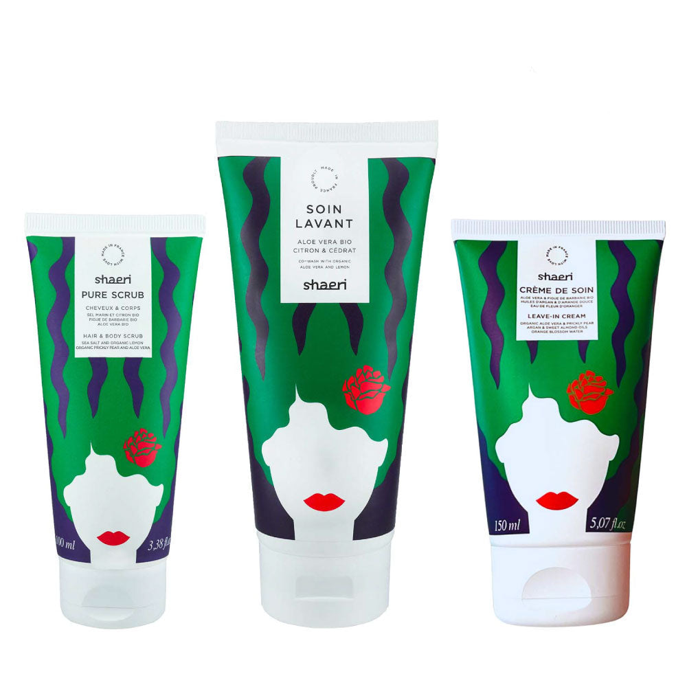 Trois produits Shaeri pour cheveux secs et bouclés : Pure Scrub, Soin Lavant et Crème de Soin, conçus pour hydrater, purifier et nourrir en profondeur.